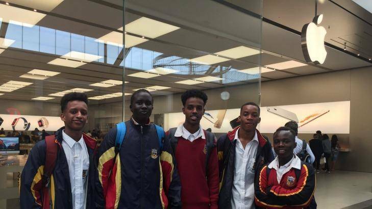 Students Petrie Alemu, Mabior Ater, Mihamed Semra, Ese Oseghale and Gereng Dere go to Apple at Highpoint Shopping Centre for the store's apology. Photo: Rachel Wells