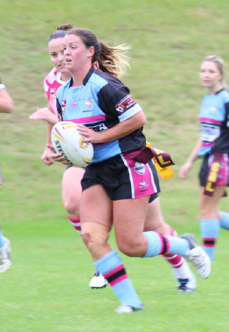 ON FIRE: Hannah Cadogan was brilliant on Sunday and scored six tries in two matches for the Sharkettes. Photo: ANDREW JONES. 