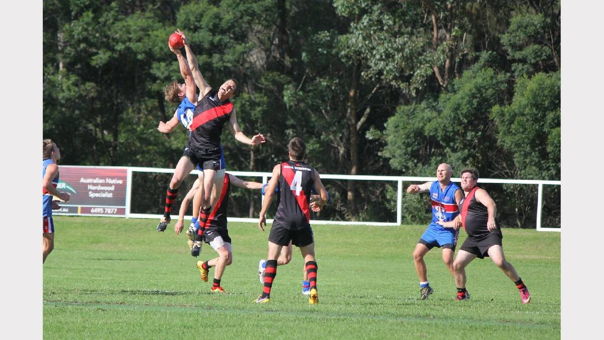 BEGA: The Bomber and Digger ruckmen go sky high to contest the ball on Saturday. 