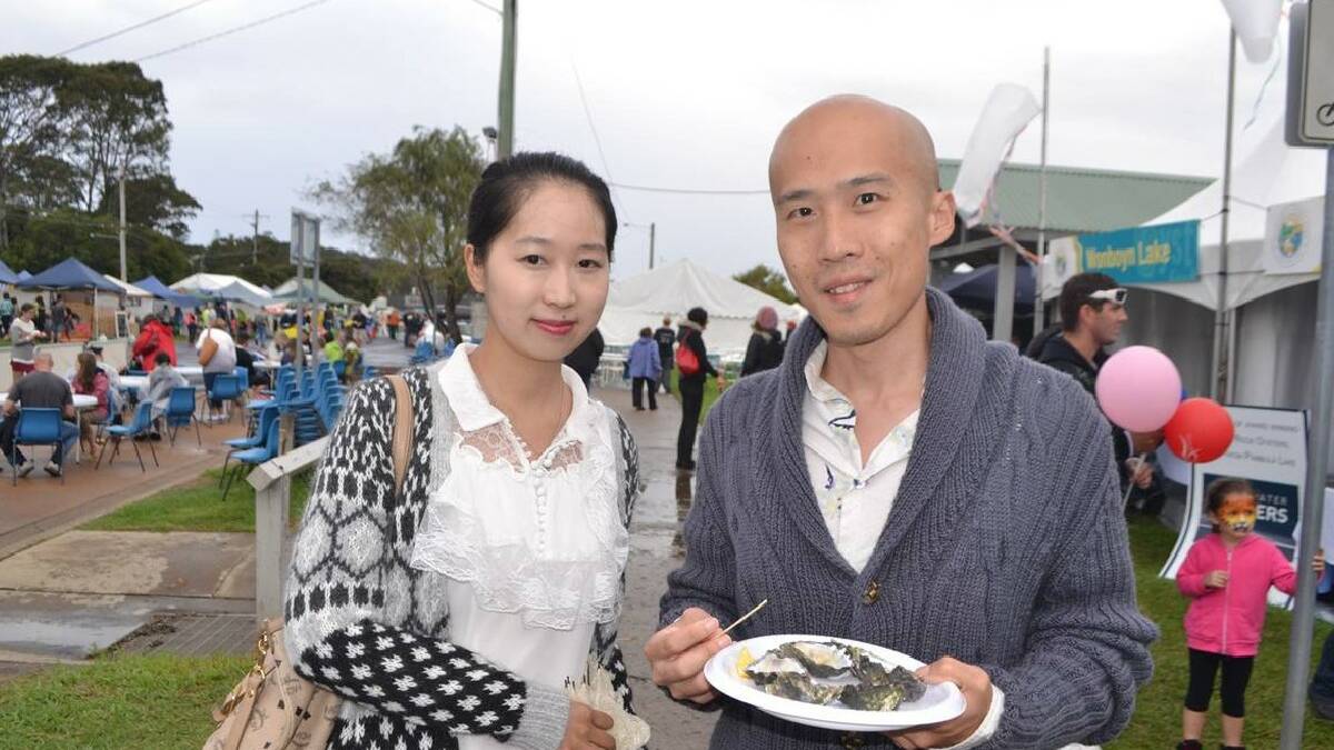 NAROOMA: Rachel Liu and Luke Lee from Sydney heard about the Narooma Oyster Festival on the Chinese micro-blogging website Sina Weibo thanks to some slick marketing this year.