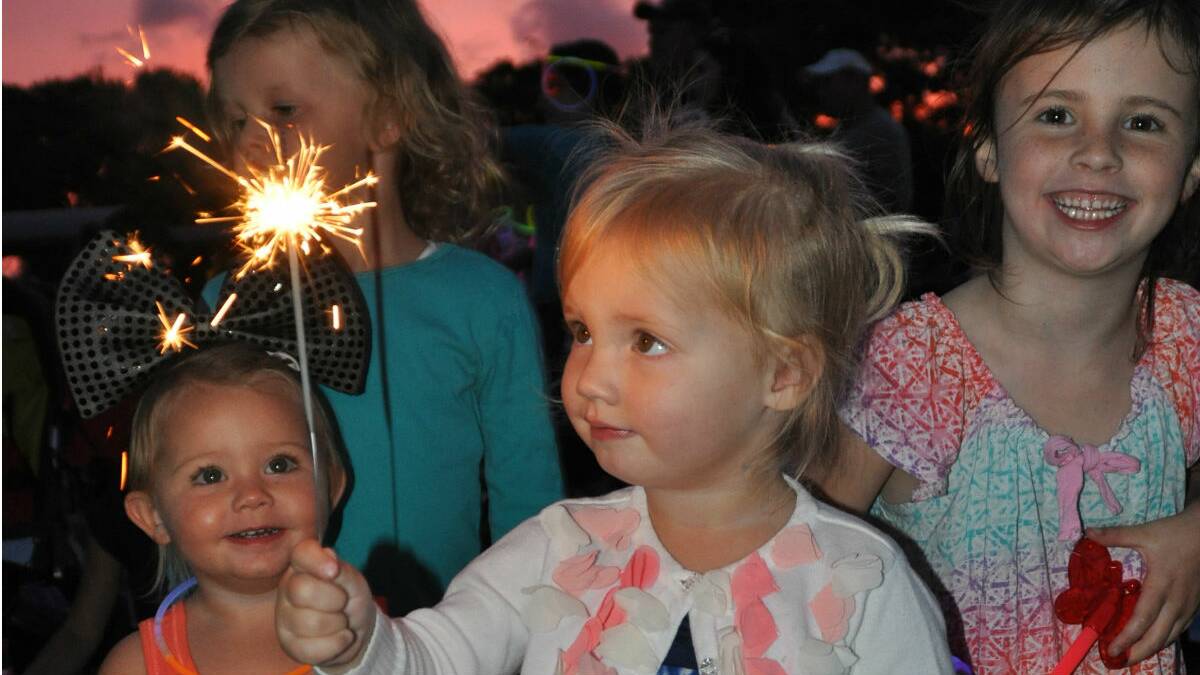 MERIMBULA: Phoebe Nagle, of Tathra, sparkles 

at a family friendly New Year’s Eve celebration at 

Ford Oval, Merimbula. 