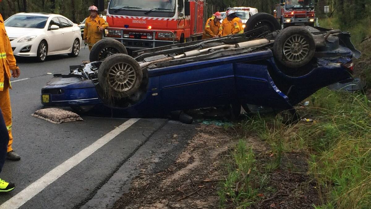 ULLADULLA: Three people from Kanahooka amazingly 

managed to walk away from the blue Ford Falcon that 

crashed and rolled on the Princes Highway at 

Jerrawangala last week.
 