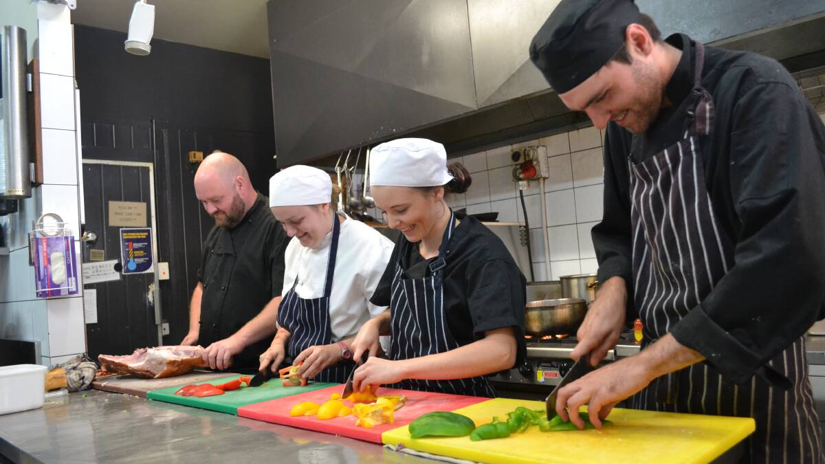 Deli on Kinghorne head chef Wes Glanville with his team Rebecca Collison, Caitlin Pummeroy and Matthew Dyason prepare tonight's Christmas treats.