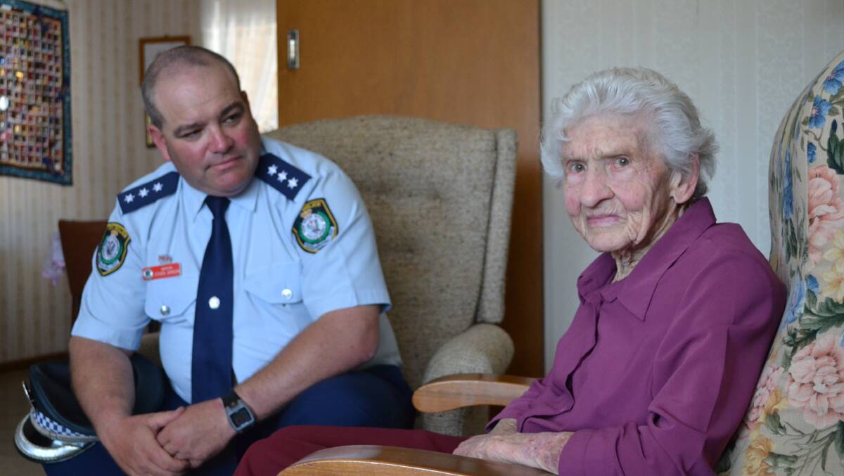 Inspector Steve Johnson with Bomaderry’s Bessie Garratty (88) following her encounter with a masked intruder in her home in the early hours of Saturday morning. 