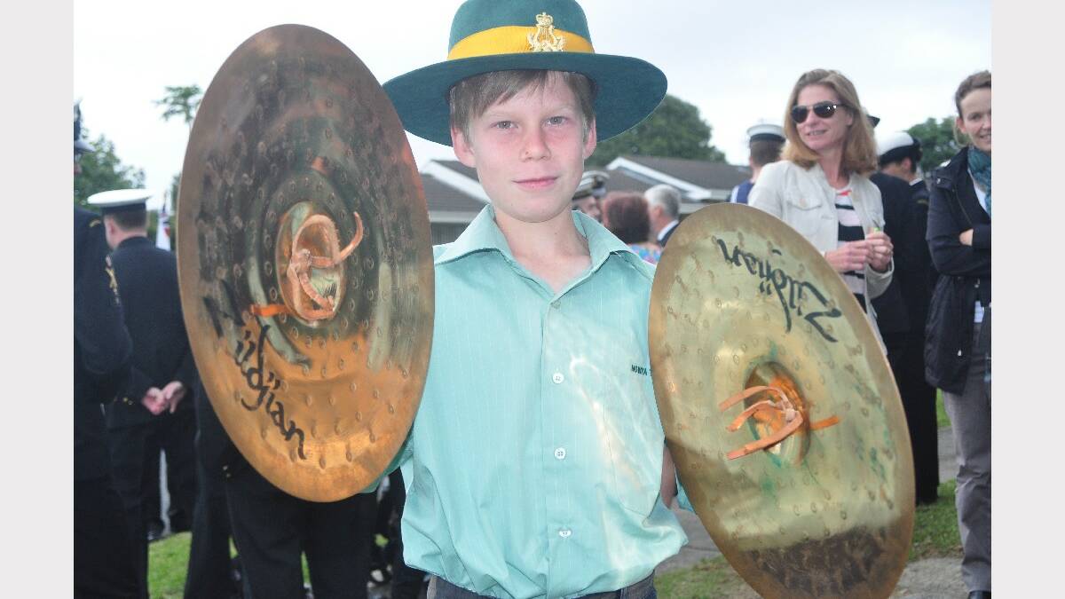 Cooper Harris from the Nowra Town Band gets ready to march and play. 