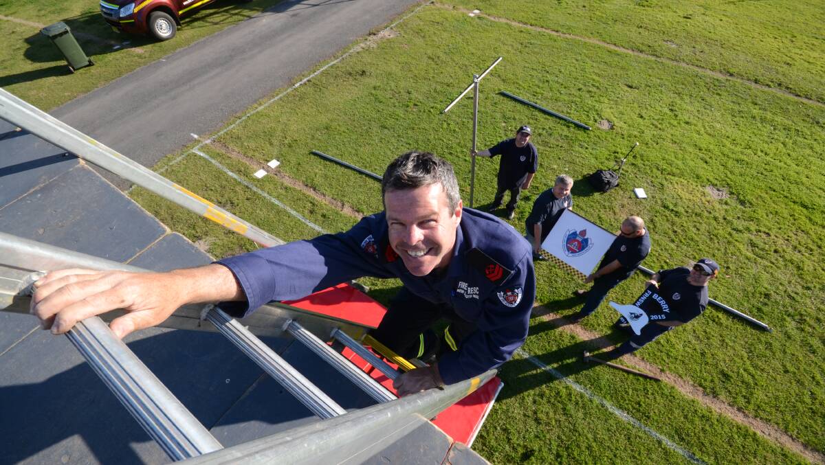 HOT SHOT: Berry retained firefifghter Ross Goodger and fellow firefighters help set up the challenges for the Regional Firefighter Championships on the weekend.