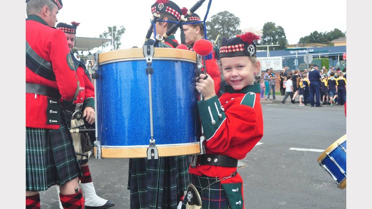 Lara Bradshaw gets set to play the drums with the Shoalhaven Pipes Band.
