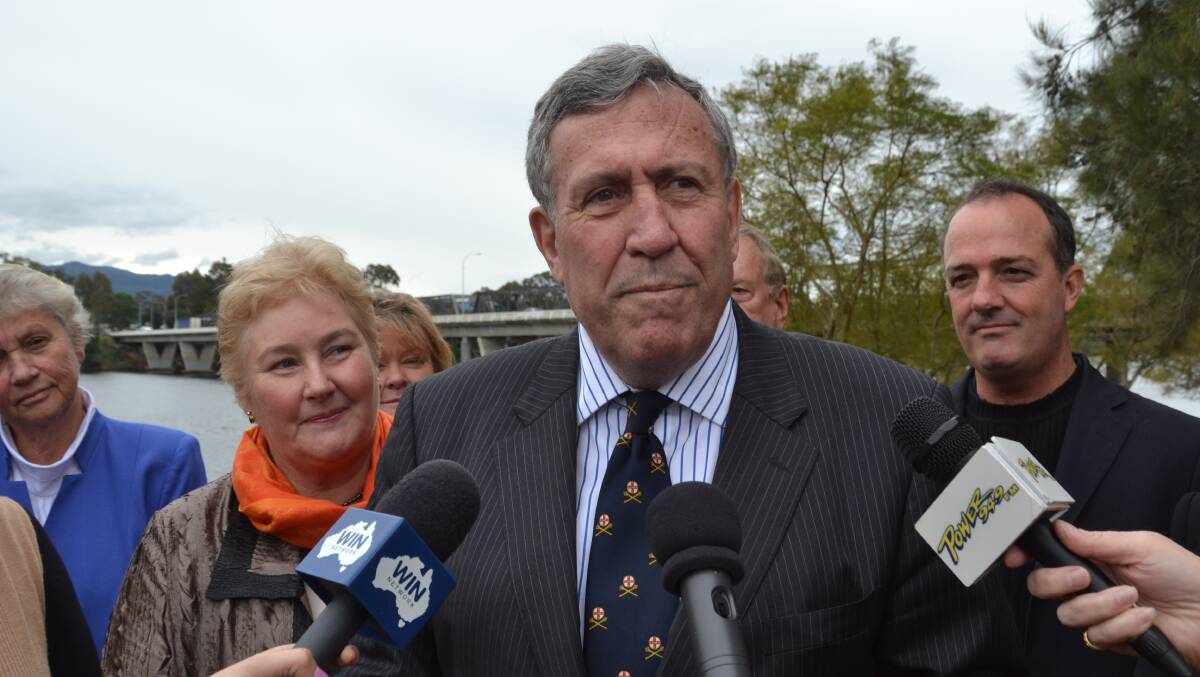 Minister for Roads Duncan Gay announces the location of the next Nowra bridge amid a sea of local state and federal politicians in Nowra on Wednesday.