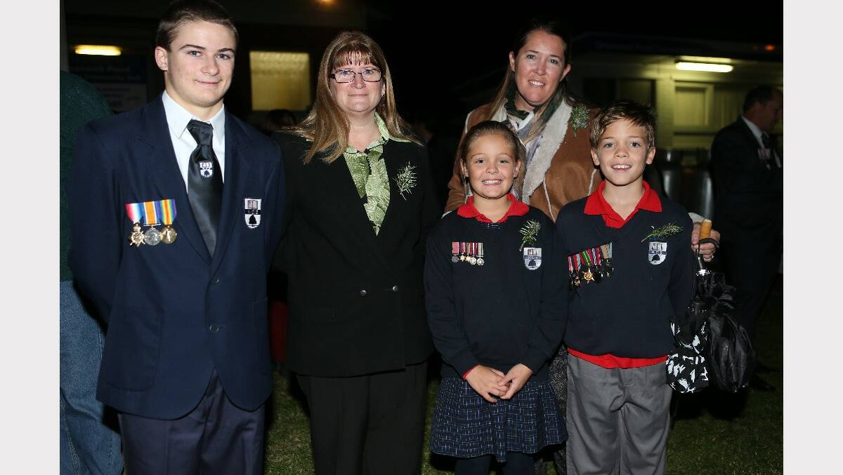 Representing Nowra Christian School at the Anzac Day dawn service at Greenwell Point were Josh and Margaret Parsons, Michelle Collison with Lila and Archie.