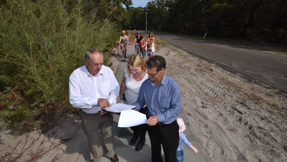 VITAL LINK: Shoalhaven councillors Greg Watson and Jemma Tribe take a look at the new shared path that will link Callala Beach with Myola with president of the Callala Beach Progress Association Greg Westlake. 