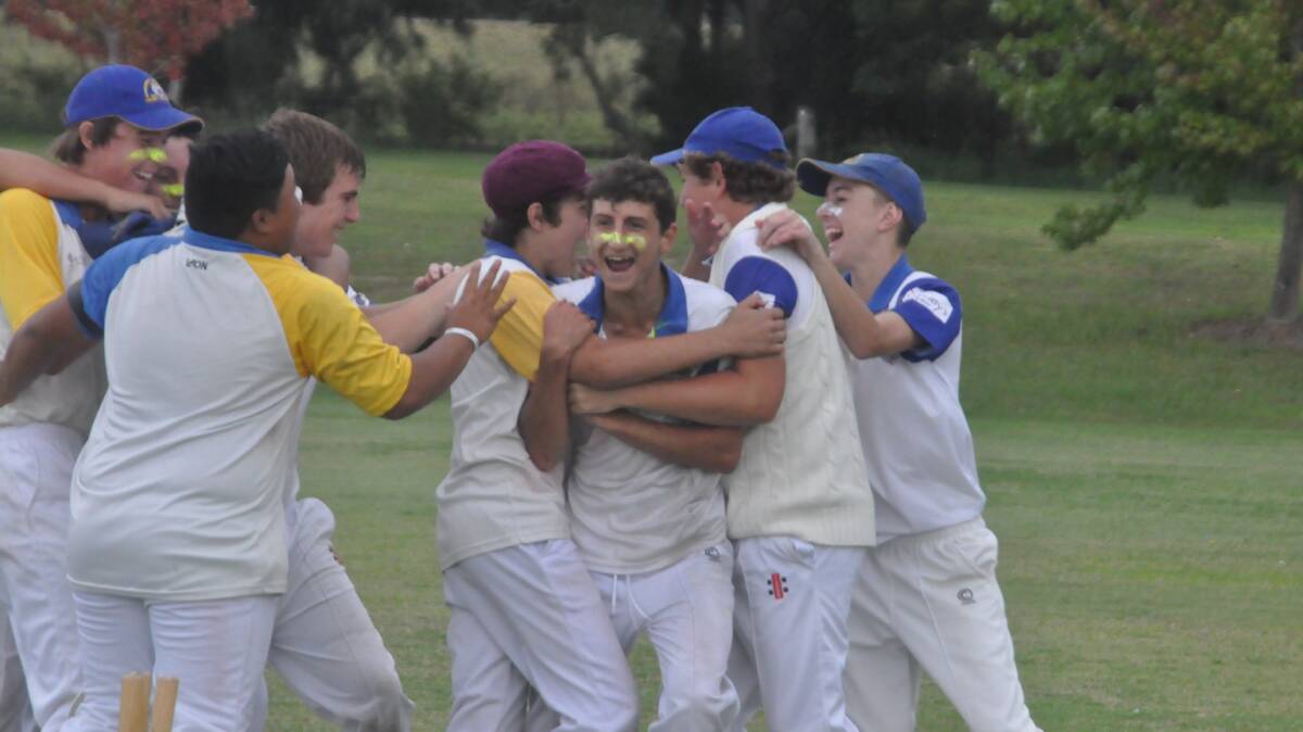 WINNERS ARE GRINNERS: The Bomaderry under 16s team celebrate winning the uder 16s title on Sunday. 