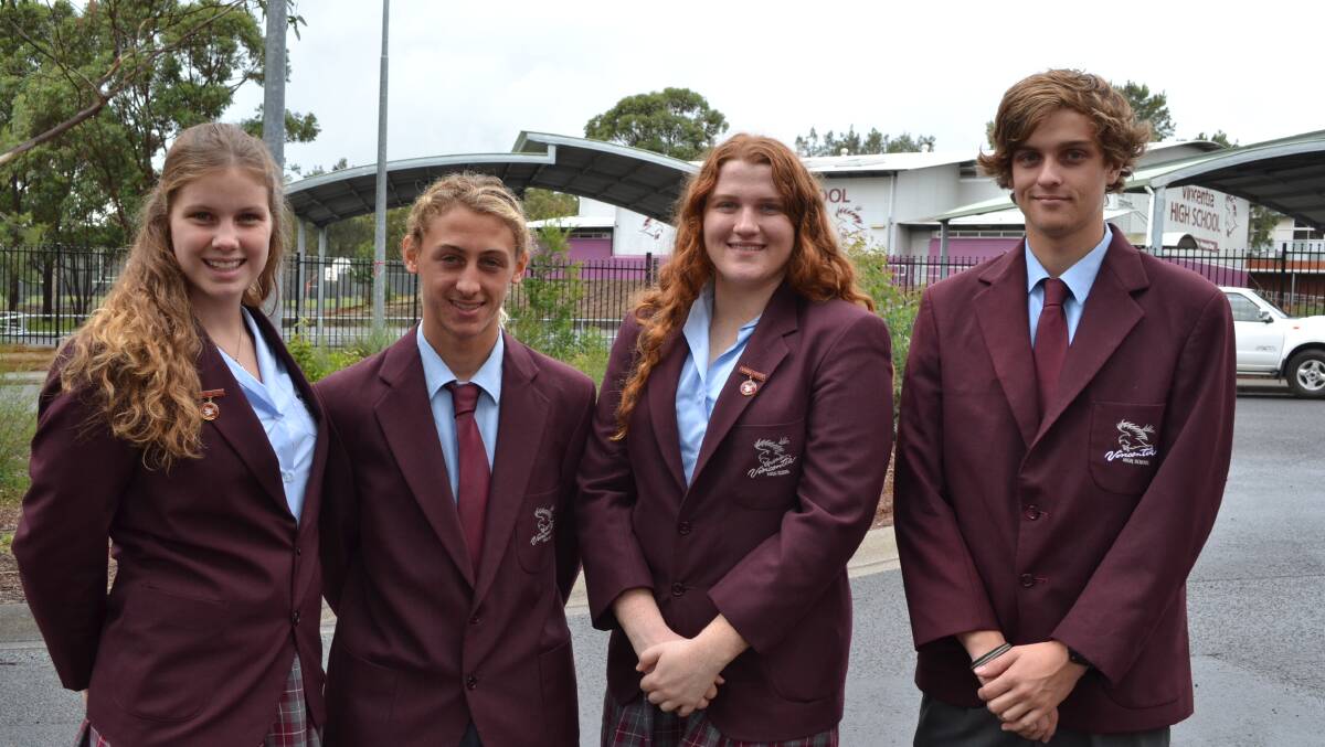 OPPORTUNISTIC: Vincentia High School vice-captains Sarah Kenny and Wade Garin and captains Lara Norton and Jason Laing led Education and Training assistant minister Simon Birmingham and Gilmore MP Ann Sudmalis on a tour of the school’s facilities for vocational education programs.