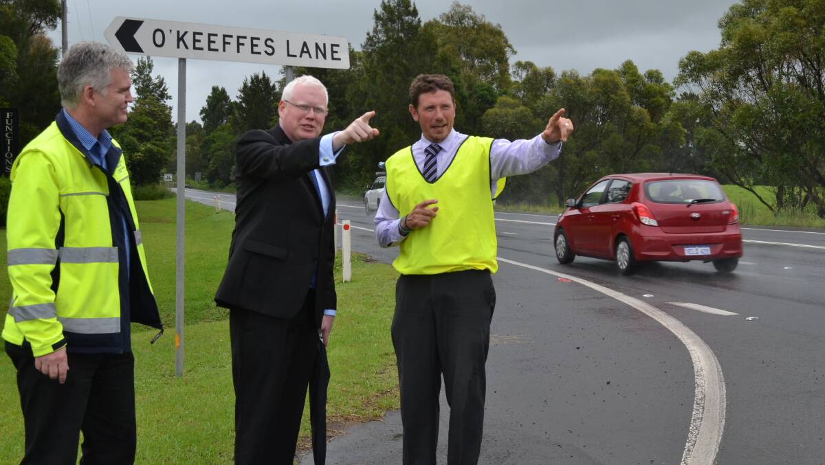 ROAD WORK: Kiama MP Gareth Ward (centre) discusses the proposed upgrade of the Princes Highway between Berry and Bomaderry with RMS project/contract manager Shaun Walsh and RMS acting regional manager Adam Berry.