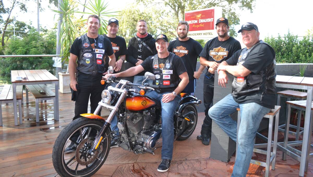 HEAVY METAL: NSW greats Brad Fittler, Jack Elsegood, Matt Cooper, Steve Menzies, Josh Perry, Nathan Hindmarsh and Ian Schubert at the Bomaderry Hotel on Monday morning before heading out on the 2015 Hogs for the Homeless Tour.