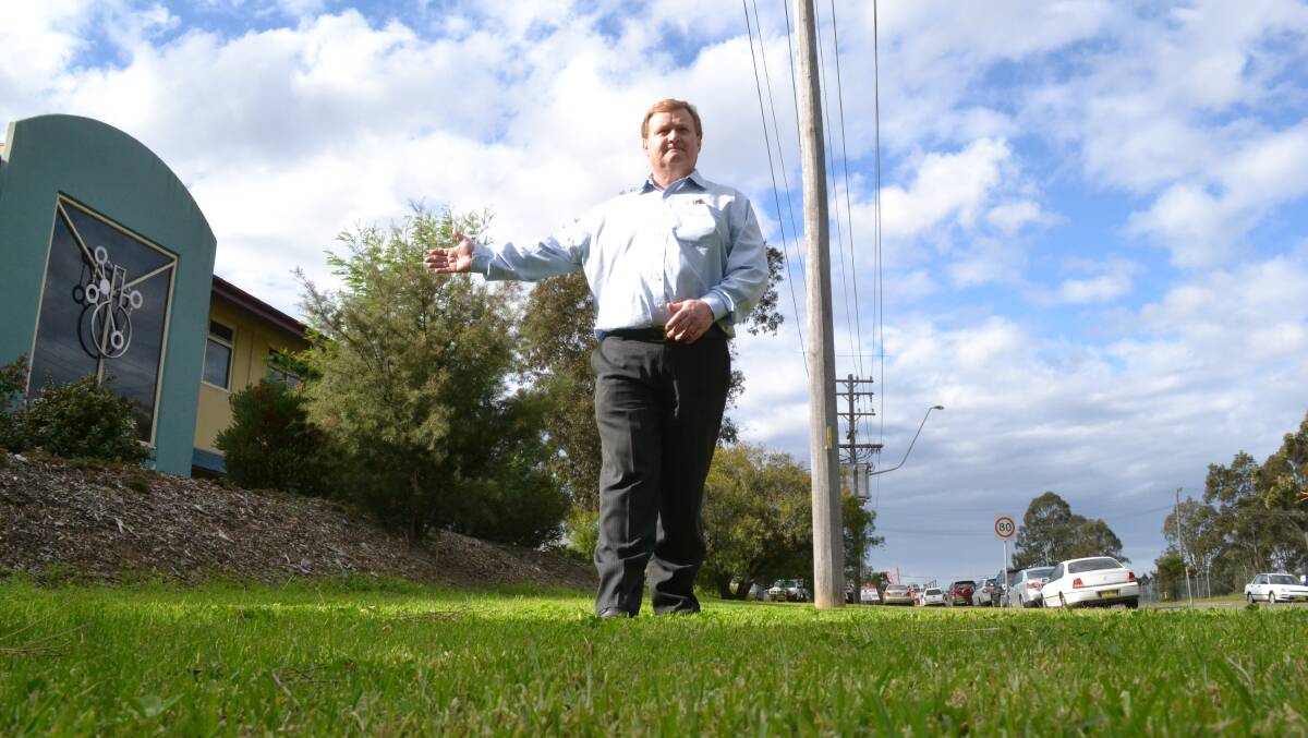 RAW DEAL: Nowchem managing director John Lamont says South Nowra businesses receive fewer services than their Nowra CBD counterparts, with many undertaking their own street scaping and gardens and mowing nature strips around their businesses.