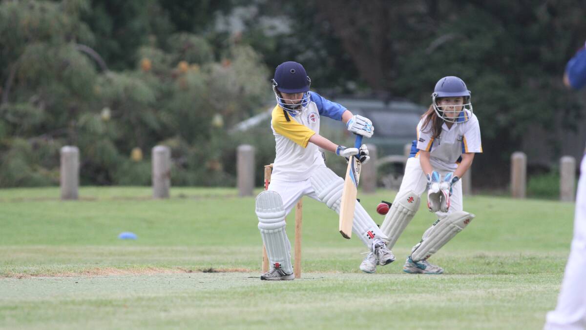 GOOD HIT: Ex-Servos/Bomaderry’s Bayden Manwarring plays a sneaky shot in his team’s under 10s semi-final on the weekend. Photo: THERESE SPILLAINE 