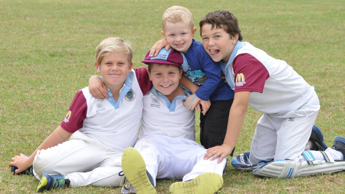 GOOD MATES: Under 10s North Nowra-Cambewarra Blues players Riley Sims, Levi Webber, their biggest fan Will Sime and Blues teammate Brodie Arkinstall will head to the under 10s grand final on Saturday.