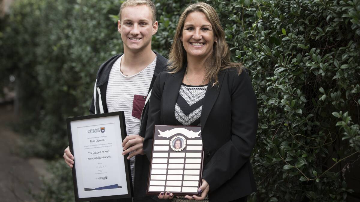 LEGACY: Shoalhaven High School graduate and current medicinal chemistry student at UOW Dale Glennan accepts the inaugural Casey-Lee Hull Memorial Scholarship, from her mother Vanessa Bourne.