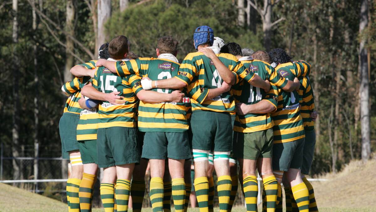BROTHERS IN ARMS: Shoalhaven Rugby Club members in a past huddle.
