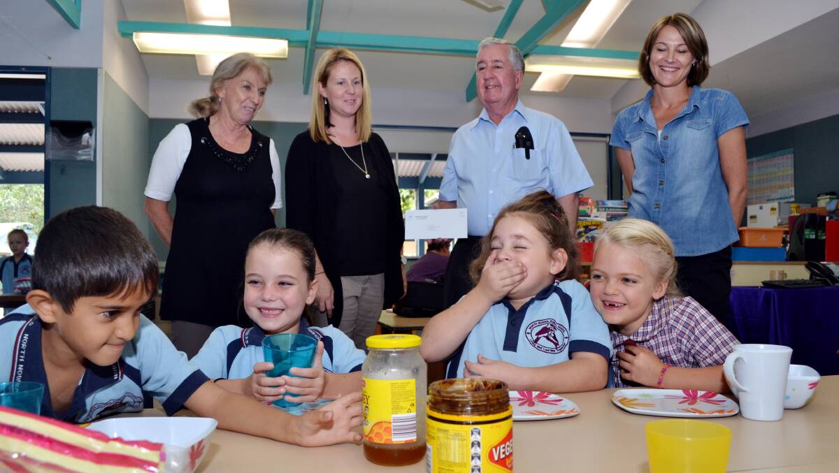 GREAT START: North Nowra Public School principal Julie Ashby, breakfast club co-ordinator Bronwyn Payne, Brian Hanley from Manildra and breakfast club co-founder Rae Thomson with students Tommy Ganatra, Lenai Spender, Danielle Molloy and Layla Volpatti are excited at the financial boost given to the school’s breakfast club.