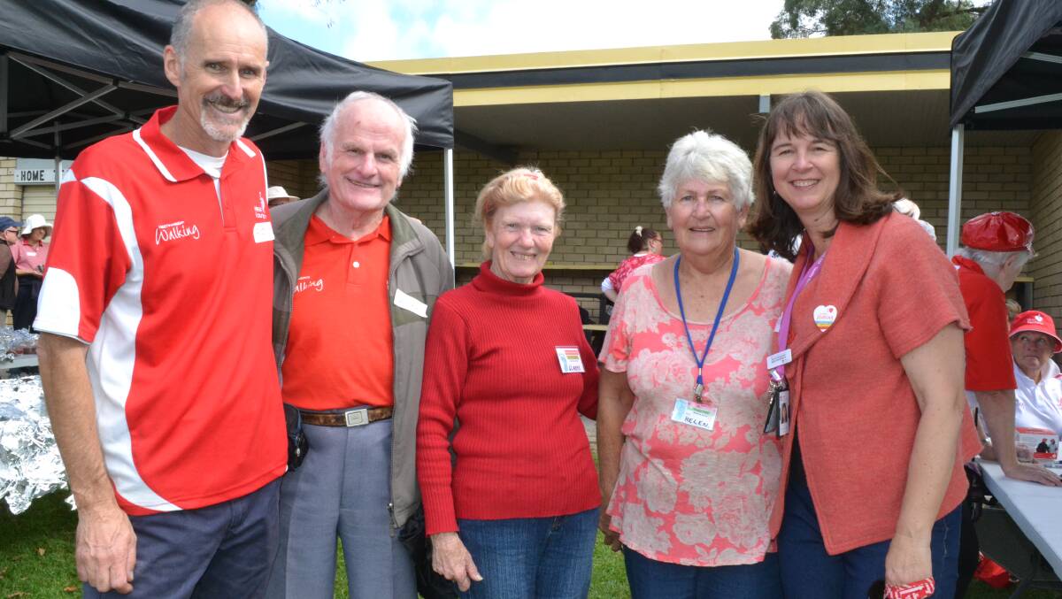 WALK THIS WAY: Heart Foundation regional co-ordinator Andy Mark with John Lennon, Gladys Chapman, Helen Anderson and Illawarra Shoalhaven Local Health District health promotion officer Kim Thompson at Monday’s community walk at Bomaderry.