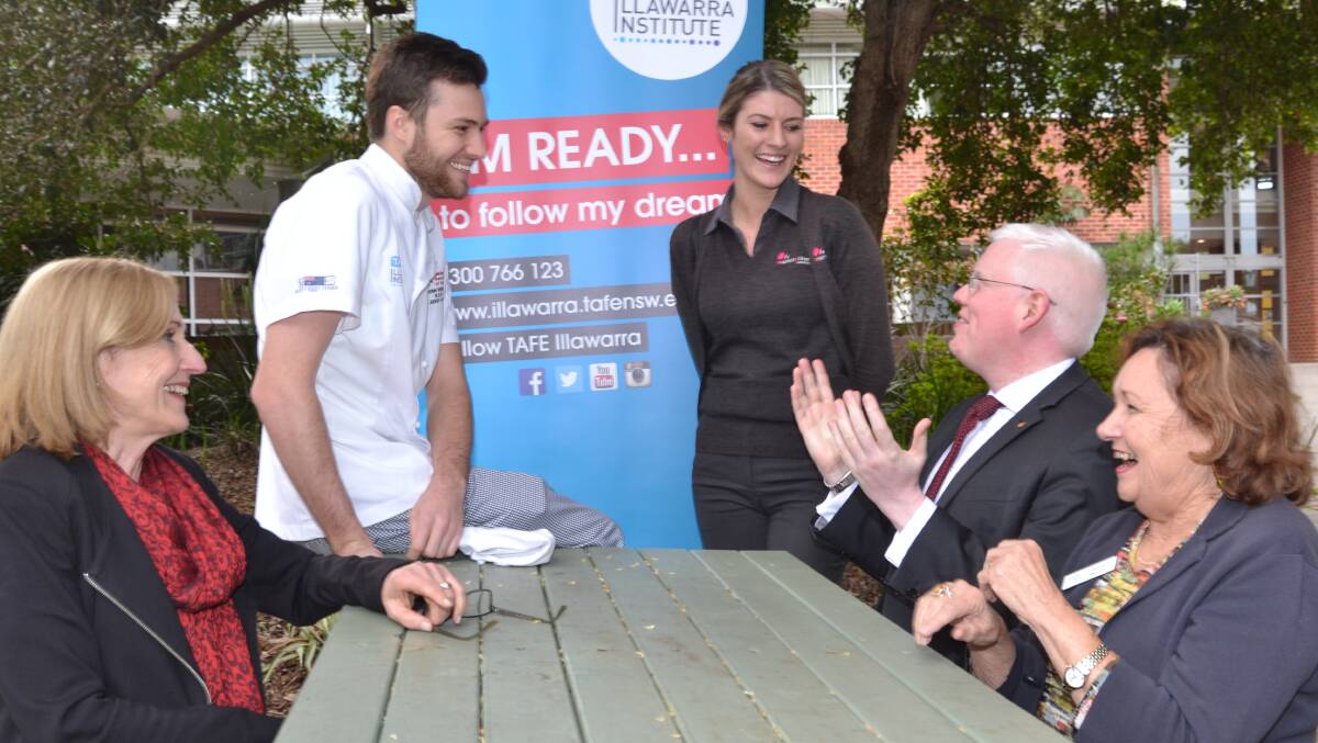 HIGH ACHIEVERS: Managing director of TAFE NSW, Pam Christie, Member for Kiama Gareth Ward and Institute director Dianne Murray, chat with high achievers John Reminis and Sobhan Leary during  a TAFE annual review last Thursday.