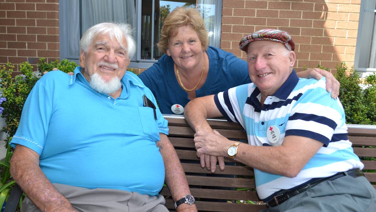 FELLOWSHIP: Red Cross CVS community project officer Dawn Bowers with two of the participants in the scheme, Dumaresq Village resident George Tester (left) and volunteer Len Muir.
