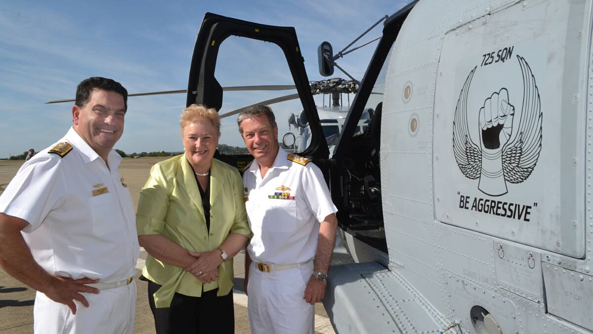 SPIRITS SOAR: Commander Fleet Air Arm, Commodore Vince Di Pietro, Gilmore MP Ann Sudmalis and Chief of Navy, Vice Admiral Tim Barrett take a look around the first aircraft in the navy’s new $3 billion Seahawk replacement program. 