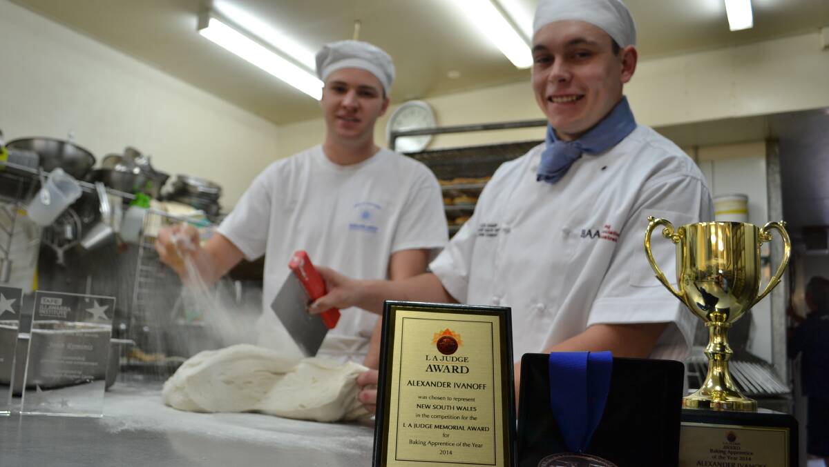 FLOUR POWER: Nowra baking apprentices John Reminis Jnr and Alex Ivanoff are all smiles after winning major awards.