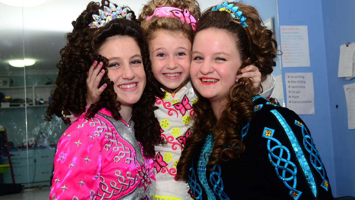 COLOUR AND MOVEMENT: Michaela, Naomi and Amy Mason are some of the finest young Irish dancers on the South Coast. 