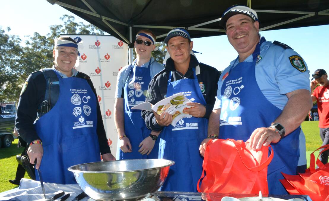 TOP CHEFS: The Shoalhaven Police Local Area Command team claimed the win in the Koori Cook Off at the NAIDOC Week family fun day (from left) Senior Constable Sarah Nicolaides, IPROWD trainee Greg Seymour, Senior Constable Nathan Ward and Inspector Steve Johnson.
