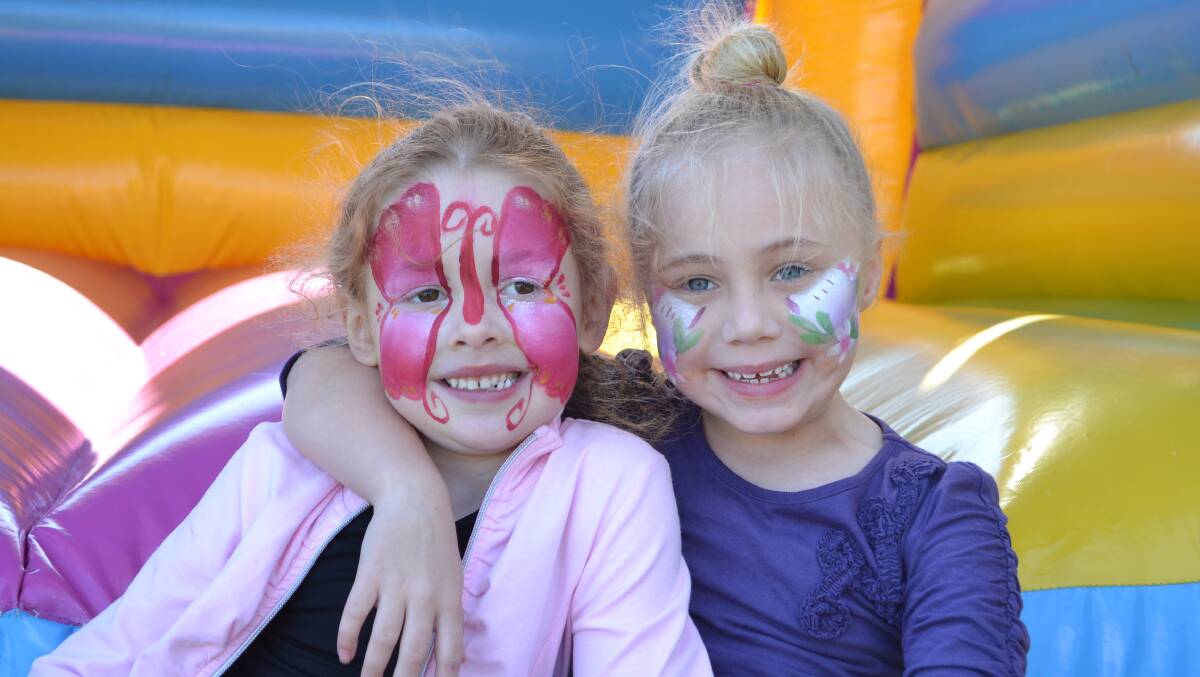 COLOURFUL CHARACTERS: Charlotte Davidson and Jacinta Logan from Berry on the Colourful Castles jumping castle at Sunday’s annual Zero2Nine Bub & Kidz Expo.