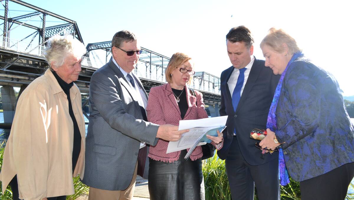 CROSS PURPOSE: RMS development manager David Corry and regional manager Renae Elrington brief Shoalhaven Mayor Joanna Gash, federal Assistant Minister for Infrastructure and Regional Development Jamie Briggs and Gilmore MP Ann Sudmalis on the progress of the proposed third crossing of the Shoalhaven River.