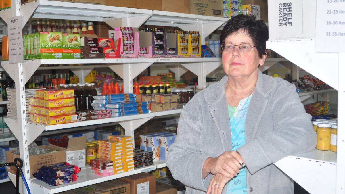 SETBACK: Volunteer Helen Esdaile hopes thieves don’t come back to the Nowra Community Store.