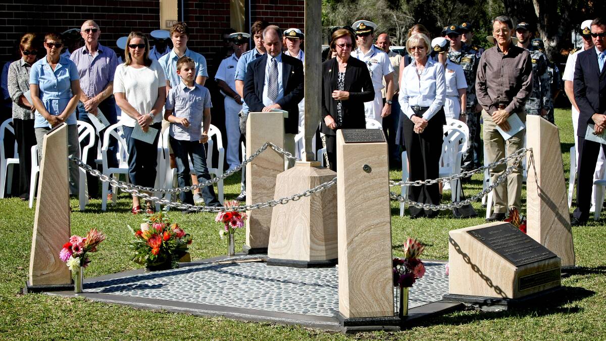 SAD REUNION: Family and friends come together to mark the ninth anniversary of the loss of nine ADF personnel who lost their lives when Sea King Shark 02 crashed during a humanitarian support mission on the Indonesian island of Nias in April 2005.