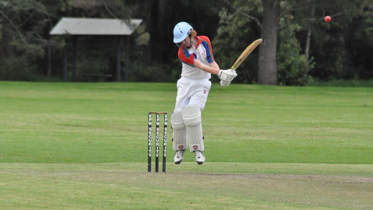ROUGH DAY: Bay and Basin’s Joe Lahene does his best to fend off a Ty Cherry bouncer on what was a tough day for their batsmen against Berry-Shoalhaven Heads. 	Photo: PATRICK FAHY  