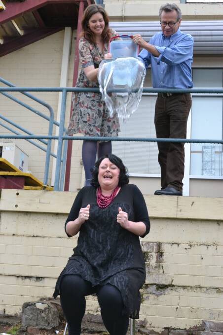 BRRR: South Coast Register and Shoalhaven and Nowra News general manager Rachael Thornett undertakes her Ice Bucket Challenge with help from Register journalist Dayle Latham and editor John Hanscombe.