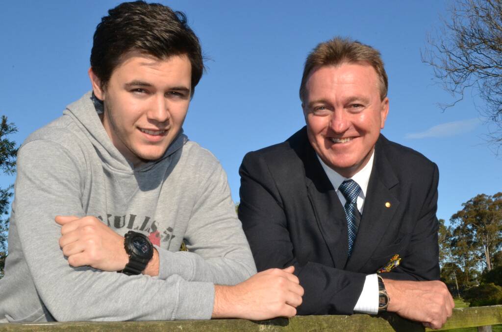 FATHER’S FOOTSTEPS: Nowra RSL Sub-Branch secretary Rick Meehan (right) with scholarship recipient Nowra Anglican College student Lachlan Vandenberg, who will walk the Kokoda Track.