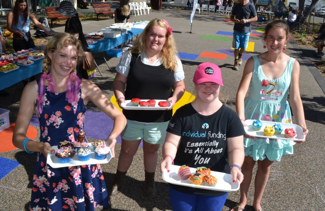 SWEET: Lonia Clapson, Emily Bailey, Samantha Keith and Maddie Mawer (cupcake princess) from Nowra enjoy the festivities at Jellybean Park for the first cupcake competition run by Essential Employees and Training in conjunction with National Youth Week.