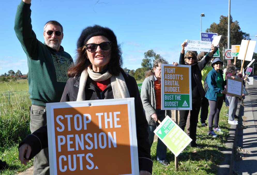 HELP THE POOR: Amanda Collins from Kangaroo Valley says the Liberal budget will “disadvantage those already disadvantaged”. She spoke at the Bust the Budget rally in Nowra.