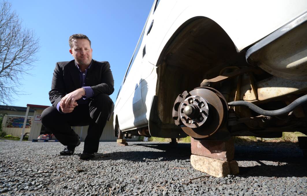 HAVE FAITH: Despite the theft of wheels from his church’s bus, pastor Jason Smith believes the Shoalhaven is a region of giving people.