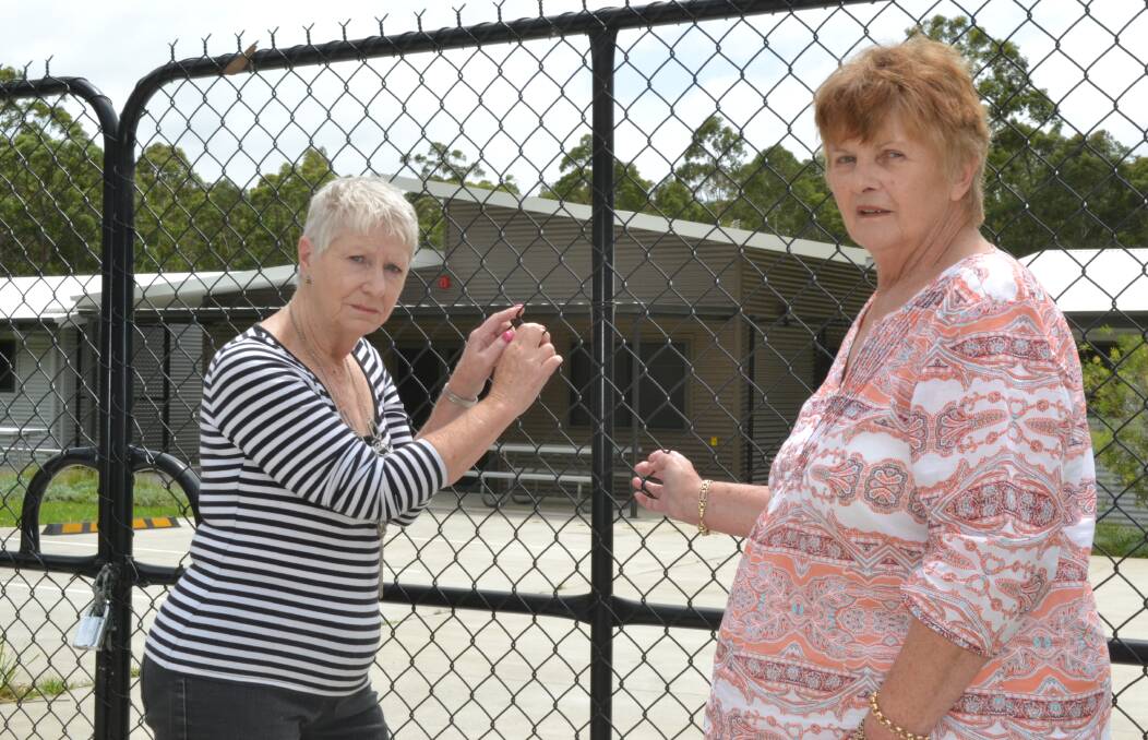 EMPTY: Shoalhaven Homeless Hub chairman June Baker and manager Kerri Snowden outside the Community Offenders Support Program centre at South Nowra, a 40-bed unit that has never opened.