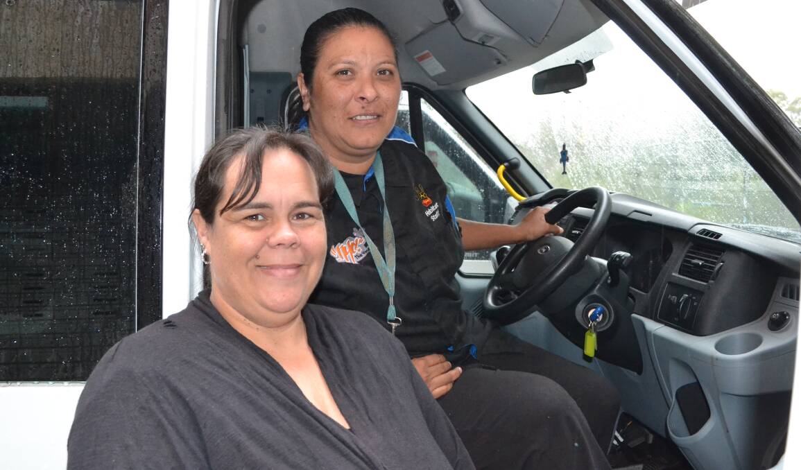 IMPORTANT SERVICE: Nowra Youth Centre manager Janet Atkins and Habitat Personnel youth night patrol supervisor Fiona Hill welcome funding to continue the bus service that aims to keep local youths out of trouble.