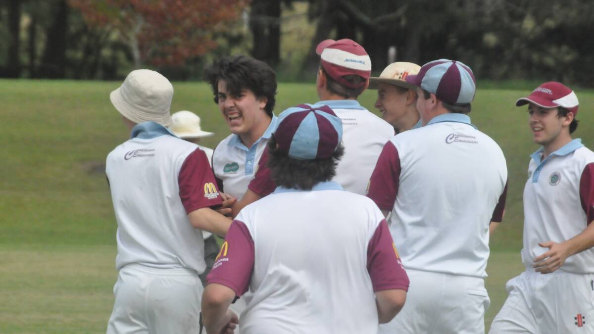 MAN OF THE MOMENT: North Nowra-Cambewarra under 16s Maroons celebrate a Liam Sutton wicket during their semi final win against Bay and Basin. Photo: DAMIAN McGILL  