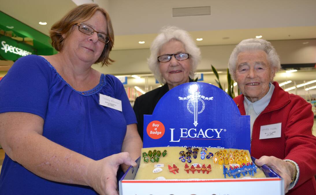 SUPPORT: Nowra Torchbearers for Legacy president Lorna Angel (centre) with fellow volunteers Debby Rayner (left) and Shirley Walsh selling Legacy badges in Stockland Nowra.