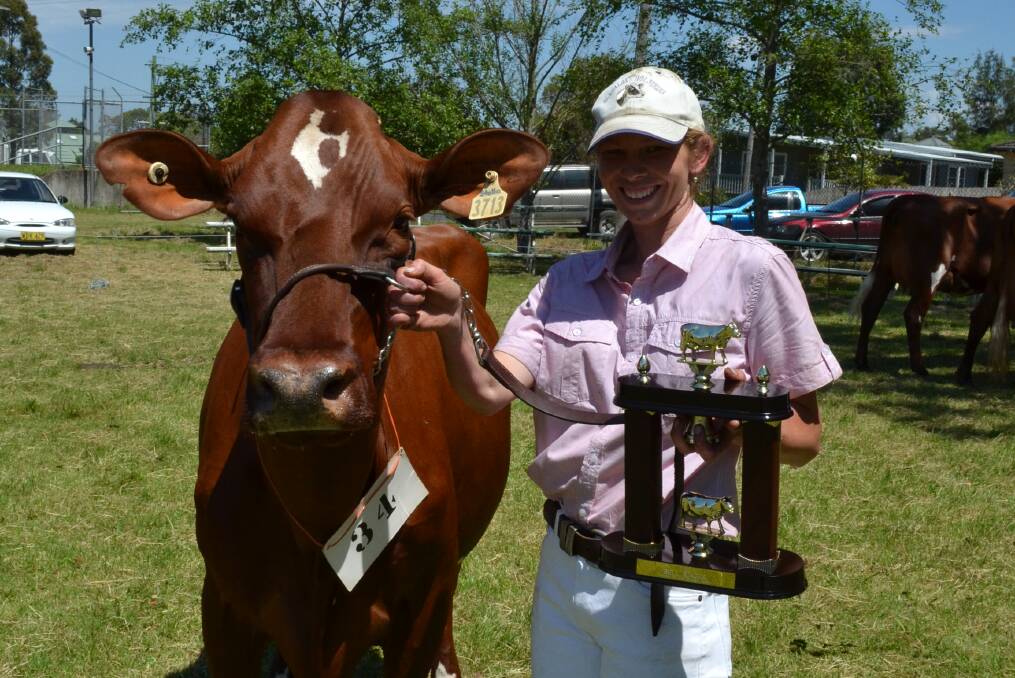 CHAMPION: Kyleigh Cochrane with champion Illawarra cow Kangawarra Stella at the Illawarra Cattle Society Spring Fair at the Berry Showground.