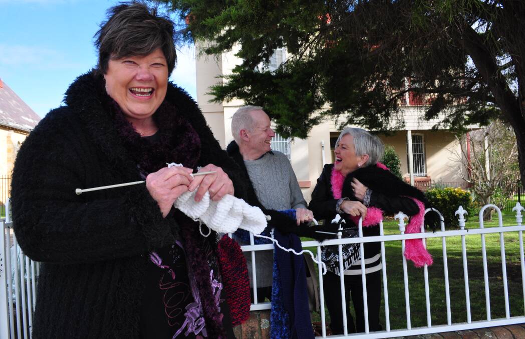GET KNITTING: Narrell Brown, Alan Blackshaw from Shoalhaven City Council and Paula Blanch are supporting the Let’s Yarn Bomb Nowra project.
