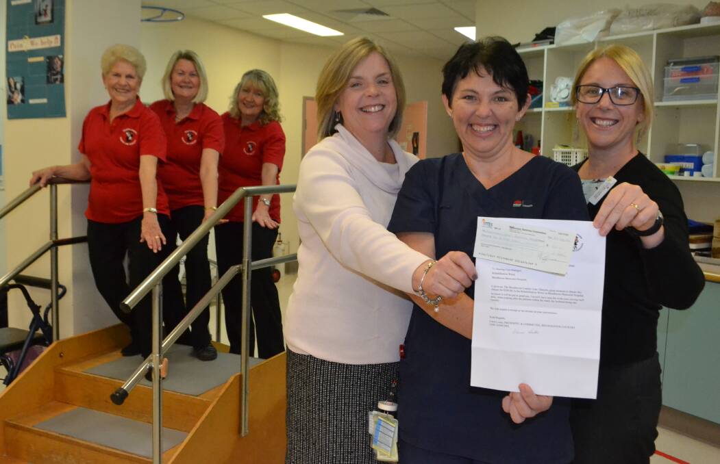 TOP TROUPE: (Back) Carol Locke, Laurel Slater and Cheryl Thornton from the Shoalhaven Country Line Dancers hand over a cheque to Rehabilitation Unit staff (front) Shanyn King, Kim Christiansen and Jacqui Cornell.