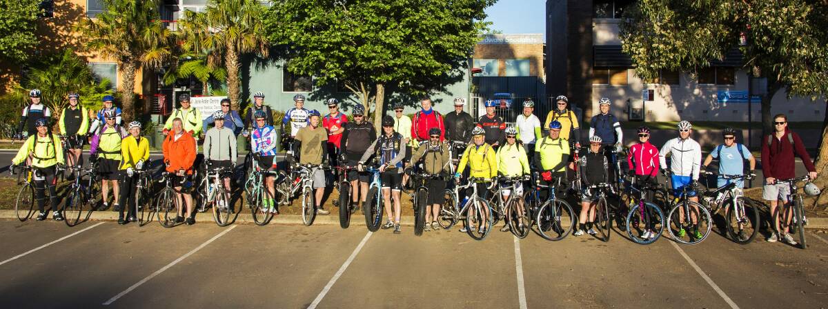 FIGHTING FIT: HMAS Albatross personnel pose for a ride up Nowra Hill as part of the Ride to Work Day.