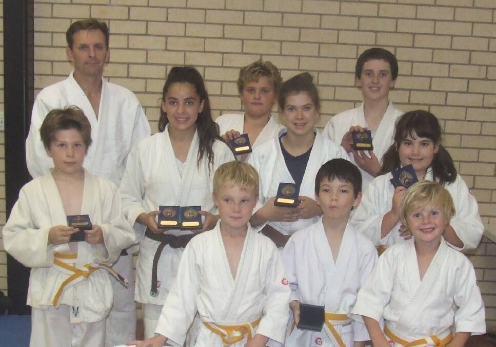 MEDAL HAUL: Shoalhaven Heads Bushido Judo Club members show off their medals won at the Shoalhaven Open Judo Championships.
